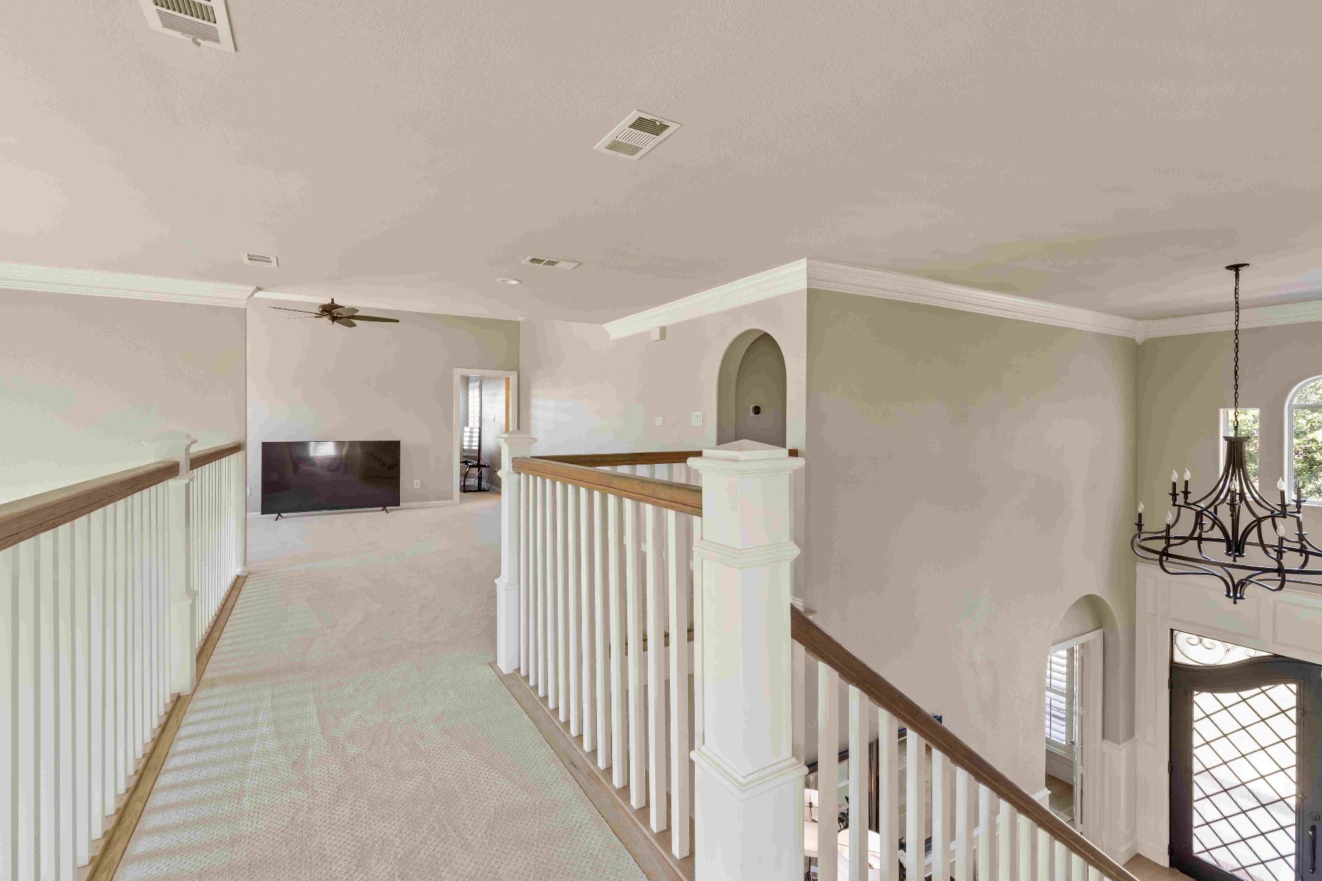 Open upstairs landing overlooking the two-story foyer