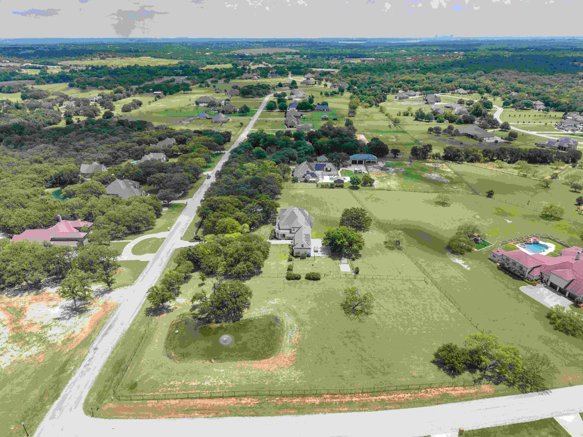 Aerial of the property with Fort Worth skyline on the horizon